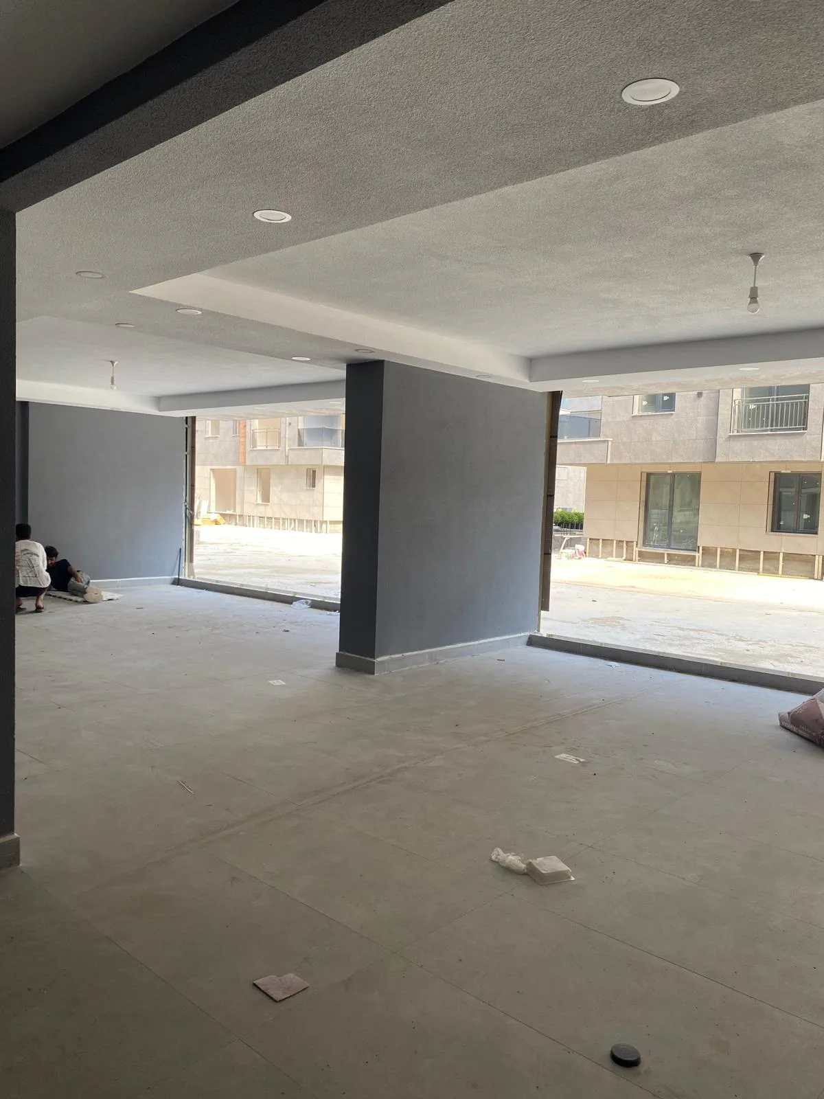 شقق للبيع في بيليك دوزو بإطلالات بحرية ومساحات خضراء